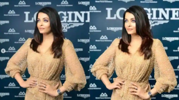 Aishwarya Rai Bachchan Dresses To The Nines With Camel Outfit In Latest Pictures