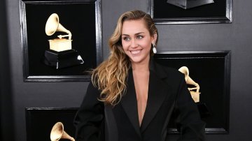 Miley Cyrus Slays The Grammy Awards Red Carpet In The Coolest Black Pantsuit