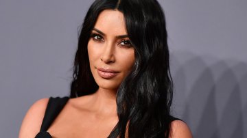 Kim Kardashian's Transformation Is Finally Back, This Time With A Striking Fire Engine Red Hair