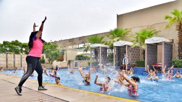 Don't Want To Sweat In The Gym? Try These 5 Fun Water Workouts This Summer!