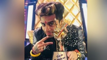 Singer Sumit Saini Lifts The Trophy Of India's Famous Reality Show "The Voice India"