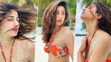 Exuding Oomph In A Floral Orange Bikini, Hina Khan Needs Her Licence To Chill Back