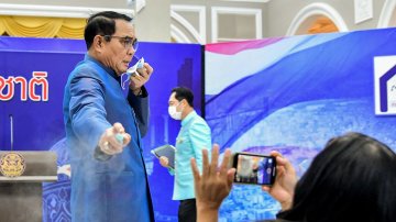 Thailand Prime Minister Sprays Hand Sanitizer Into Journalists' Face To Avoid Tricky Questions
