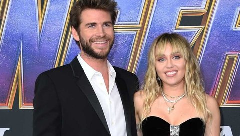 Miley Cyrus And Liam Hemsworth Look Picture Perfec