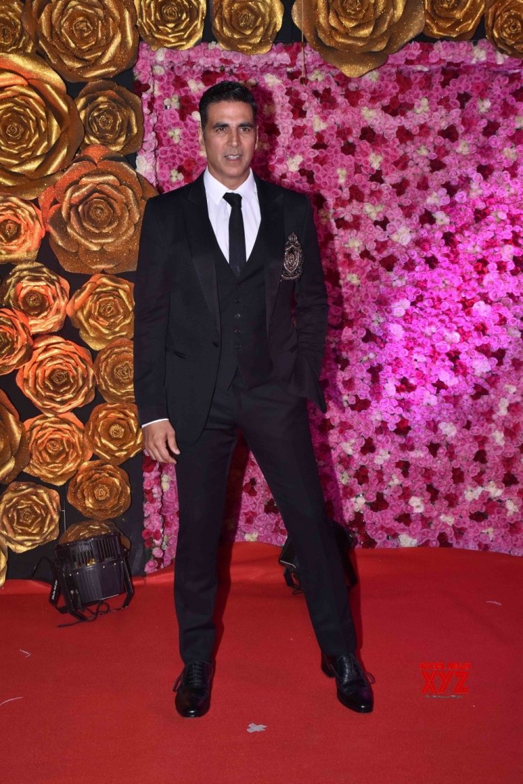 The producer Akshay Kumar looks so handsome in his black costume. 