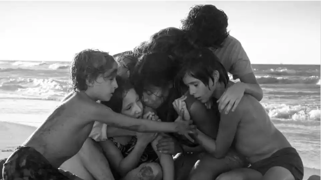 Marco Graf (Pepe), Yalitza Aparicio (Cleo), Daniela Demesa (Sofi), Diego Cortina Autrey (Toño), Marina De Tavira (Sofia), Carlos Peralta Jacobson (Paco) in Roma, directed and written by Alfonso Cuarón.