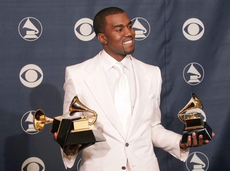 Best Grammy Photos Take A Look Back At 20 Pics of Artists Holding