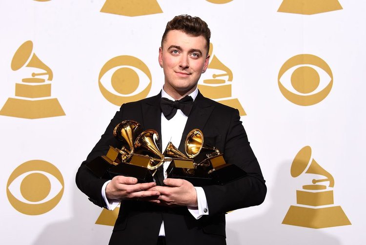 Best Grammy Photos Take A Look Back At 20 Pics of Artists Holding