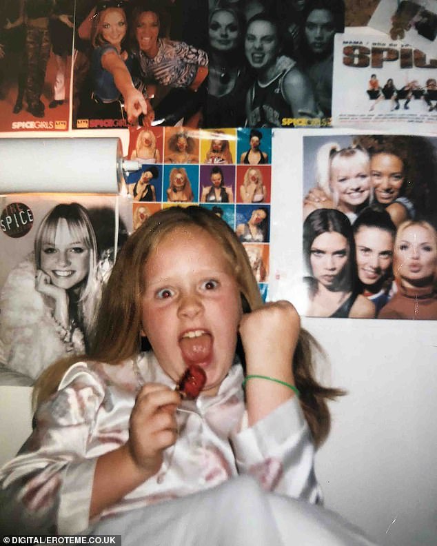 Adele shared a childhood snap showing herself surrounded by posters of the Spice Girls 