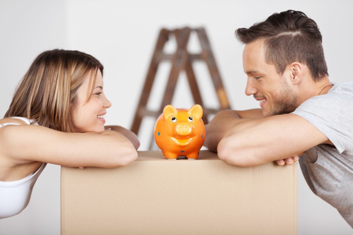 Money Saving Tips Young Couple Piggy Bank