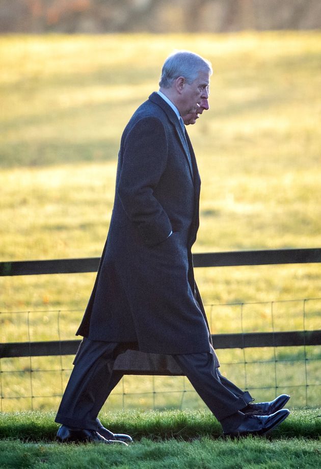 Prince Andrew walks quietly to church alongside Prince Charles (his first public appearance after the scandal)