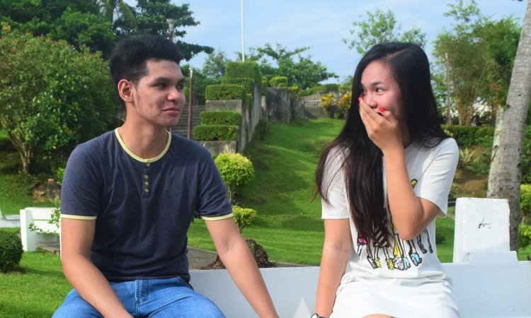 flirting signs from a woman