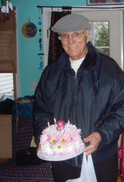 Joseph-is-holding-a-birthday-cake