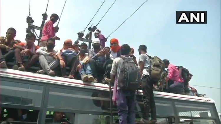 Crowd Travelling On Top Of Buses