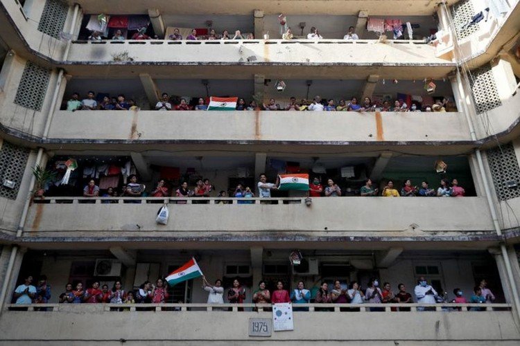 People Clap And Cheer On Balconies