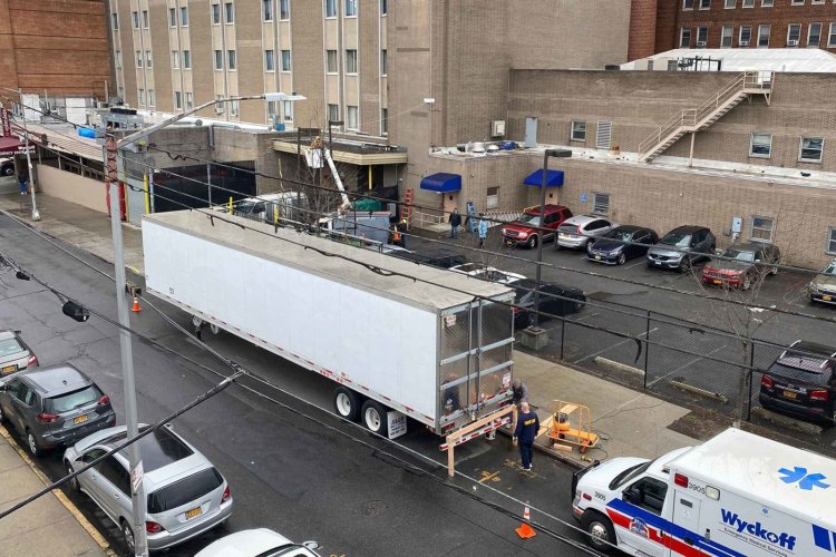 A conveyor line of dead bodies in New York