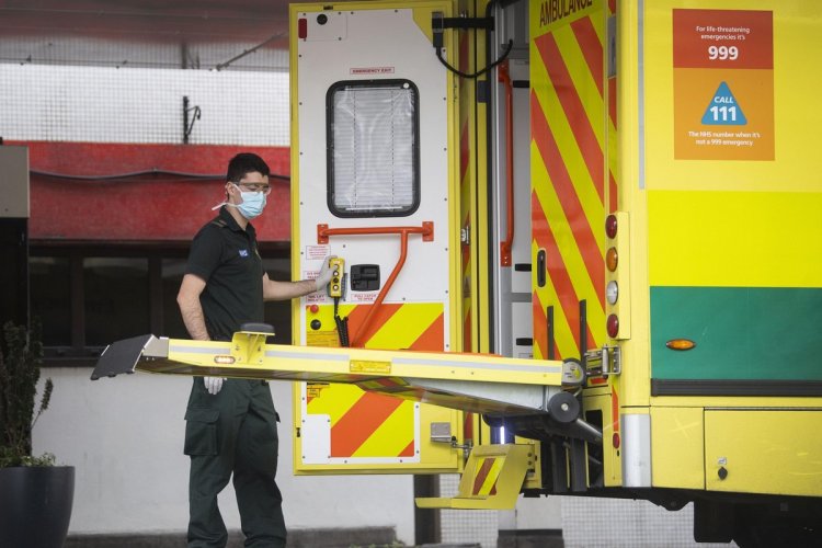 A Staff With An Ambulance In The Uk