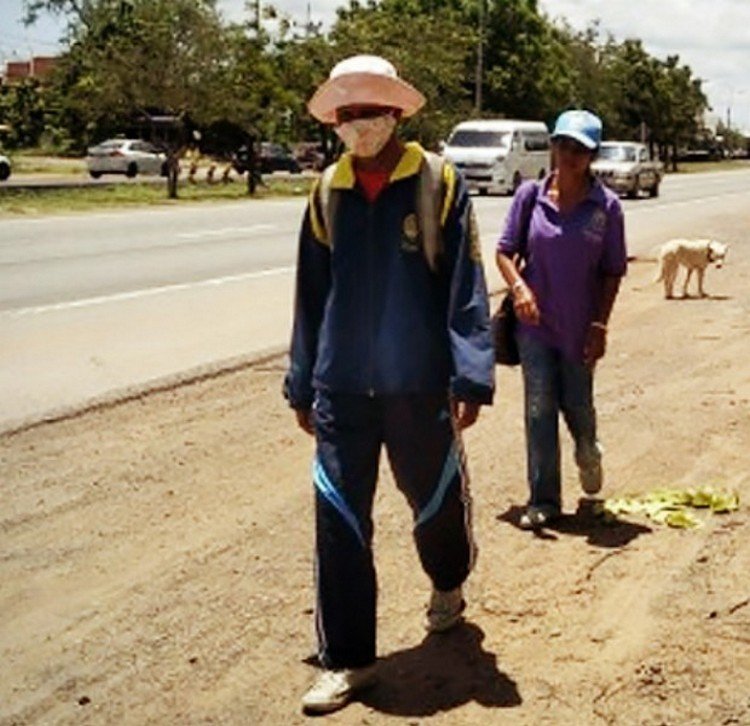 Thai Couple Walk Home To See Sick Mom