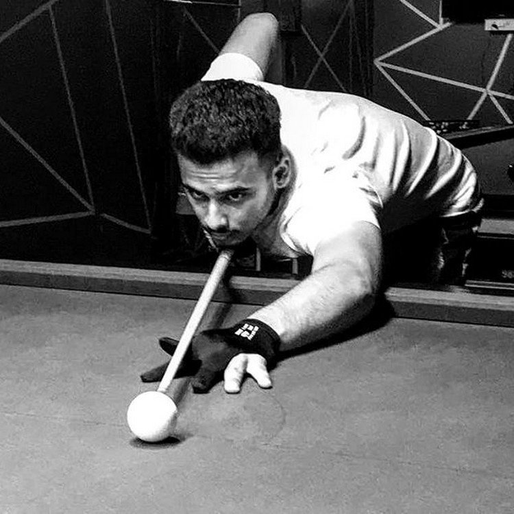 Abdul Samad playing billiards