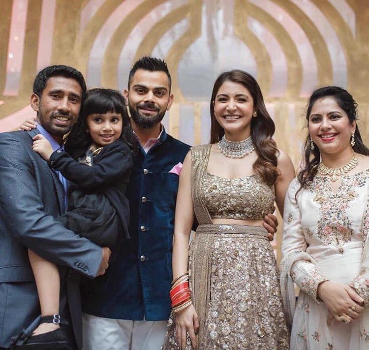 Wriddhima Sahan family and Virat Kohli-Anushka Sharma